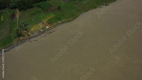 Aerial view of boats along the river for the Wholesale Jute market in Jamalpur, Bangladesh. photo