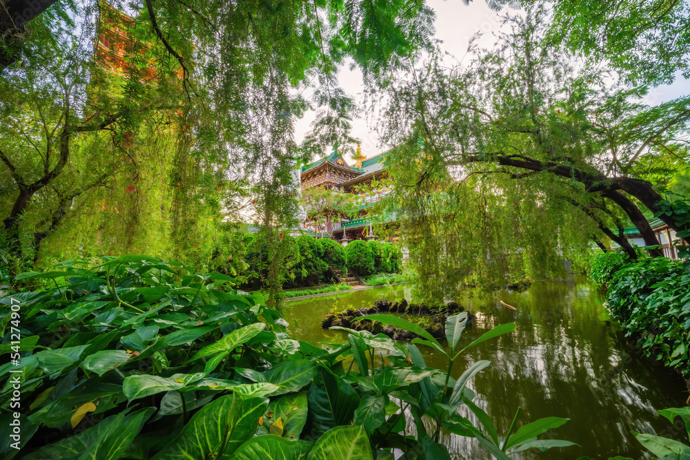 Fototapeta premium view of Minh Thanh pagoda, a majestic Buddhist architectural structure in Pleiku city, Gia Lai province, Vietnam, text in photo mean peace, compassion, forgiveness. Travel concept