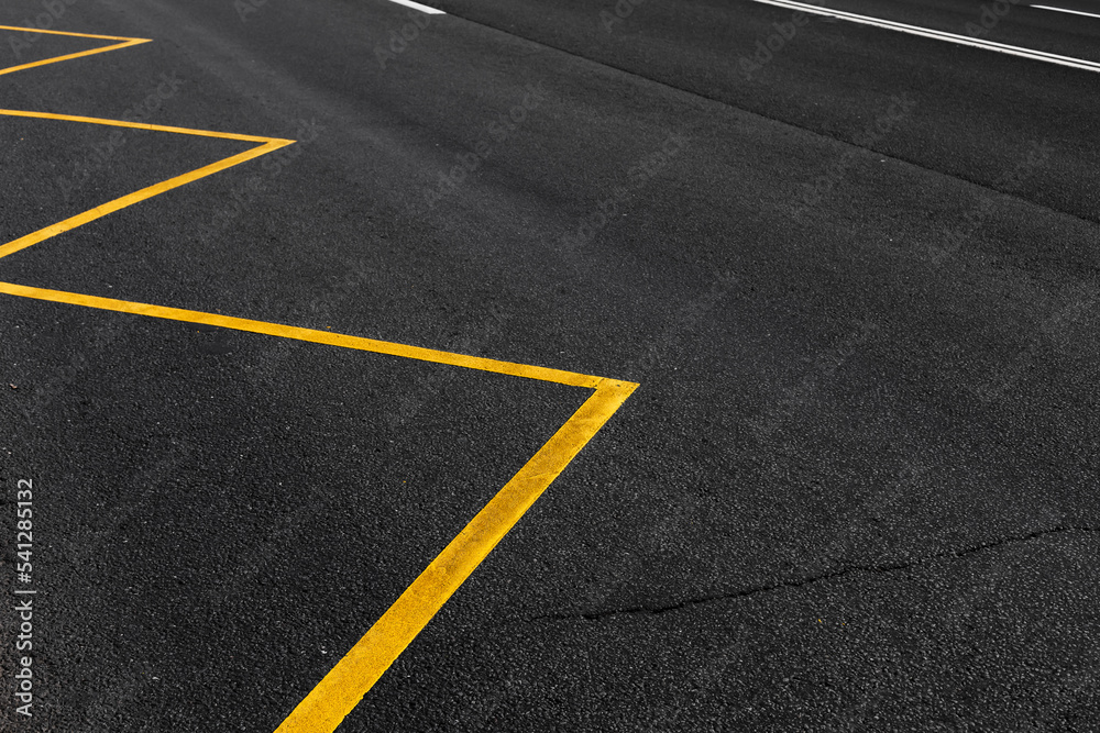 Yellow road marking of a bus stop area, abstract transportation photo