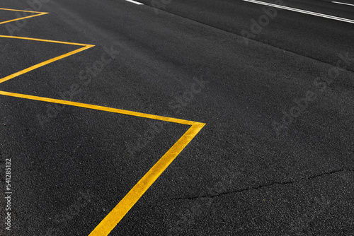Yellow road marking of a bus stop area  abstract transportation photo