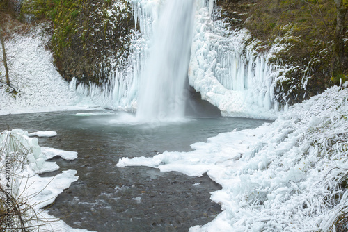 Photography Horsetail falls with icycles and frozen foilage after a week of sub-zero tempera