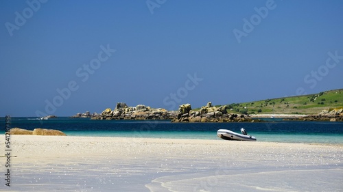 view of the beach with boats photo