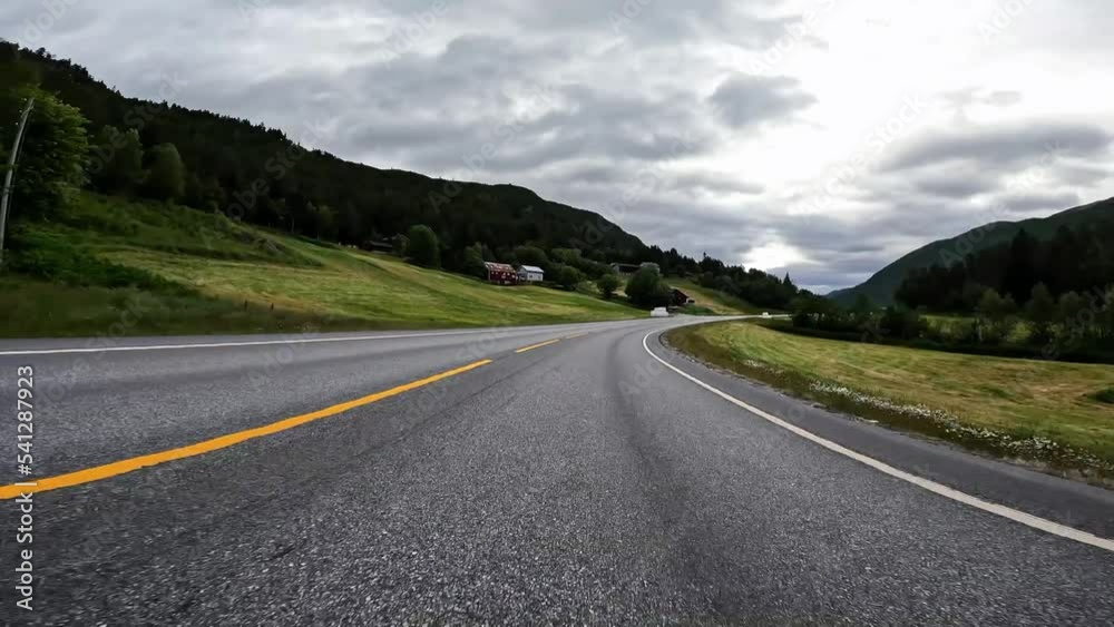 First person view of a nordic road, dark mountains, nordic noire style, gloomy, Norway First person view of a nordic road, dark mountains, nordic noire style, gloomy, Norway