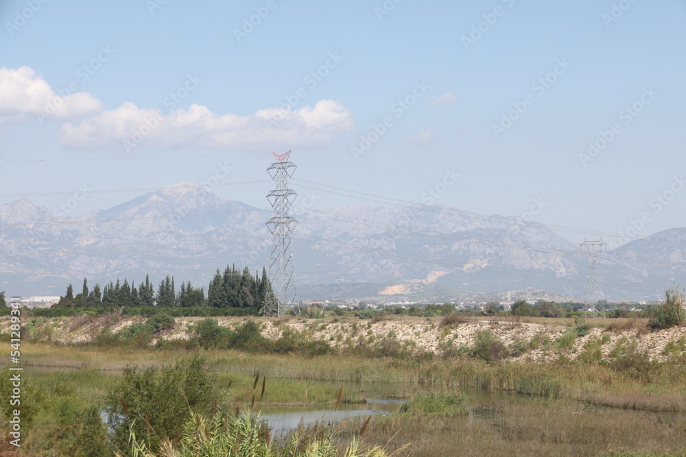 Low riverbed. Reduction of river waters in summer. Drought theme. Turkey, October 2022. Low riverbed. Reduction of river waters in summer. Drought theme. Turkey, October 2022.