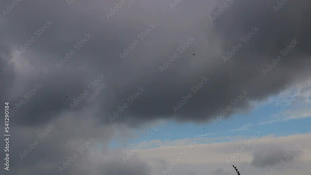 Timelapse of clouds floating in the sky with glimpses of blue sky in the video Timelapse of clouds floating in the sky with glimpses of blue sky in the video