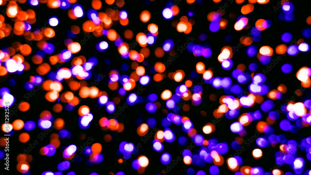 Composite video of orange and purple bokeh blur effect lights twinkling pattern in a Halloween style background. Composite video of orange and purple bokeh blur effect lights twinkling pattern in a Halloween style background.