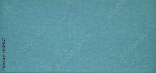 bright blue paper texture background for scrapbook concept. seamless texture of kraft or cardboard paper use as background.