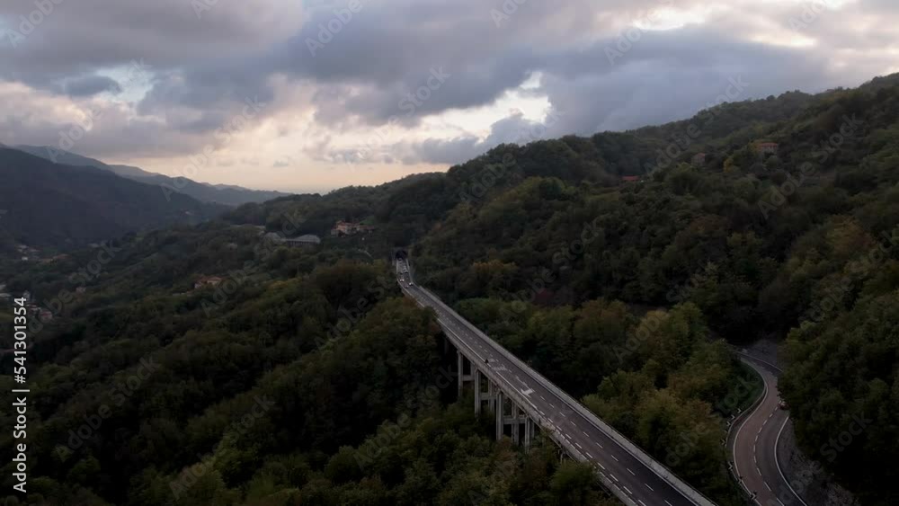 areal view of highway on bridge and mountain area areal view of highway on bridge and mountain area