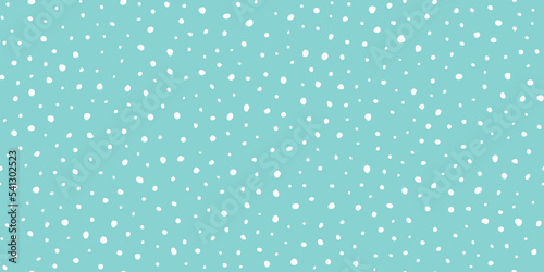Hand drawn falling snow seamless pattern, uneven round fading chaotic dots, spots, flakes. Sketched white snowflakes on sky blue repeating snowfall background. 
