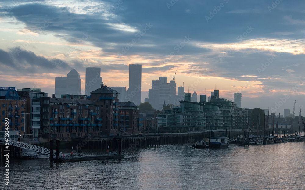 Fototapeta premium View of River Thames and City Skyline during dramatic sunrise. City of London, United Kingdom. Travel Destination