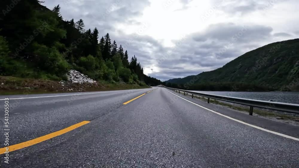 First person view of a nordic road, dark mountains, dramatic, nordic noire style, gloomy, Norway First person view of a nordic road, dark mountains, dramatic, nordic noire style, gloomy, Norway