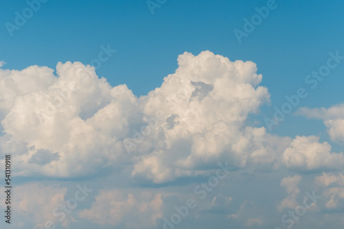 White clouds against blue sky. Daylight  cloudy day. Nature  freedom and peaceful concept