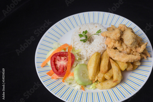 Fried chicken with rice and french fries - Peruvian Food
