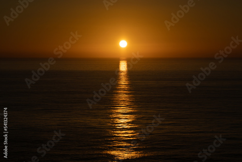 Sun and sea sunset with reflection