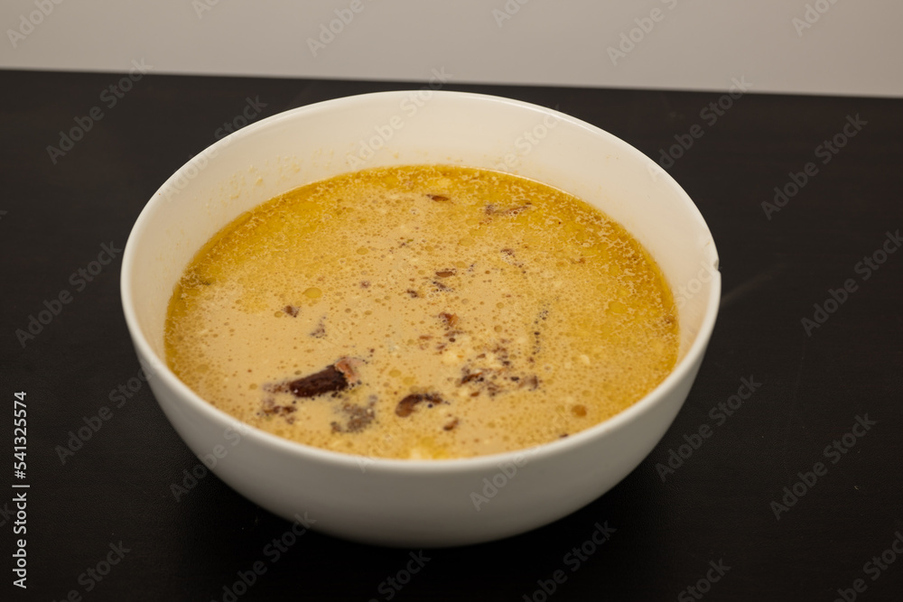Cheese Burger Soup with ground beef cheese and a white bowl Cheese Burger Soup with ground beef cheese and a white bowl