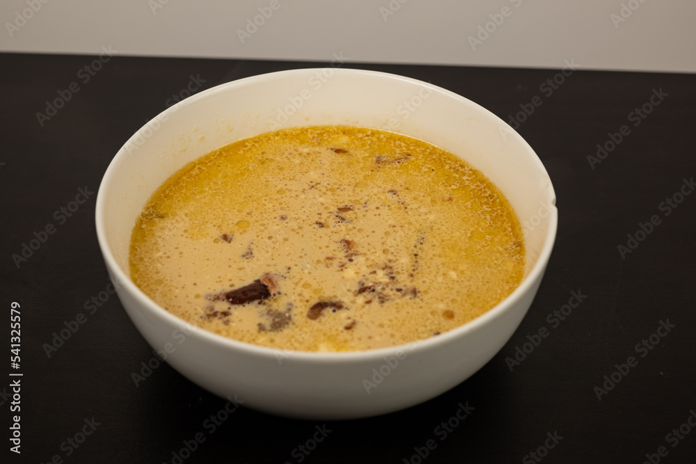 Cheese Burger Soup with ground beef cheese and a white bowl Cheese Burger Soup with ground beef cheese and a white bowl