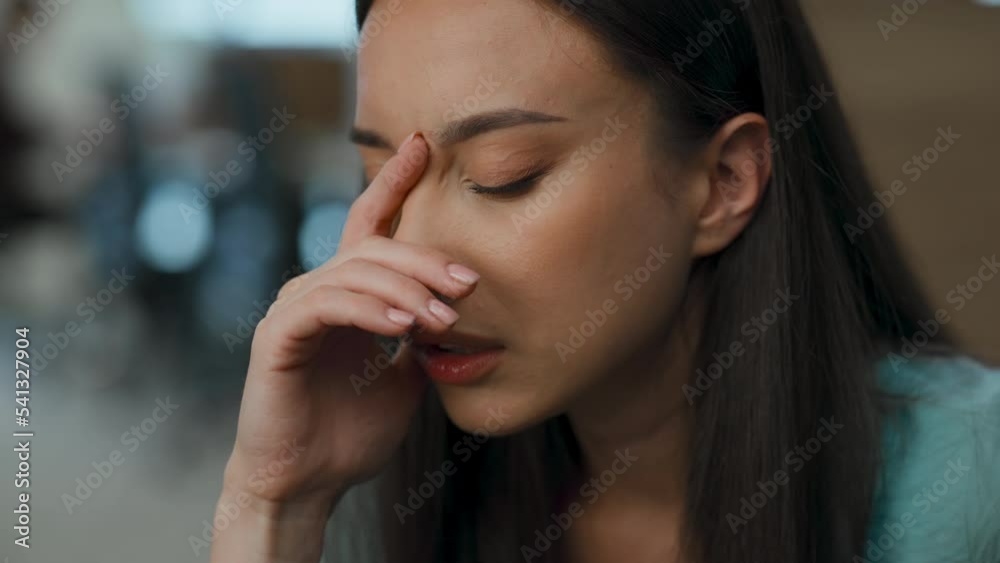 Stressed woman crying workroom alone. Frustrated office manager thinking problem Stressed woman crying workroom alone. Frustrated office manager thinking problem