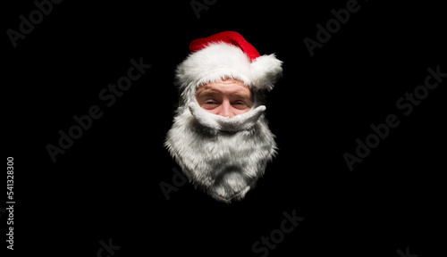 Fake Santa giving a funny look to the camera.