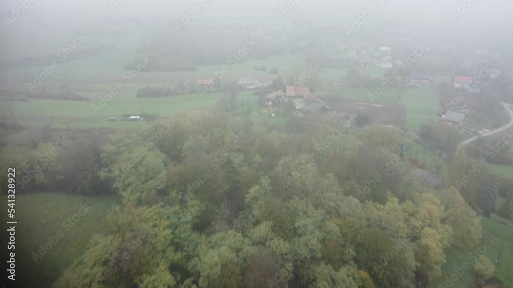 foggy day in a hilly area, white mountain forest, shot with a drone foggy day in a hilly area, white mountain forest, shot with a drone