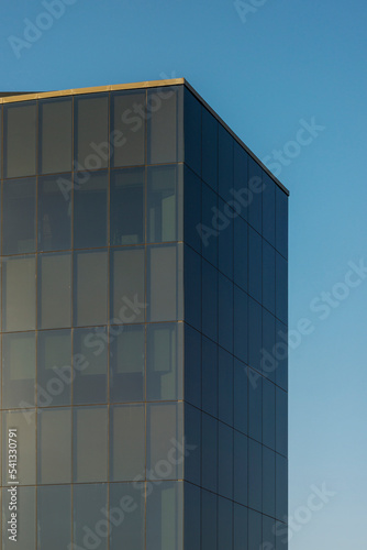 Facades of office buildings with dark glass and metal