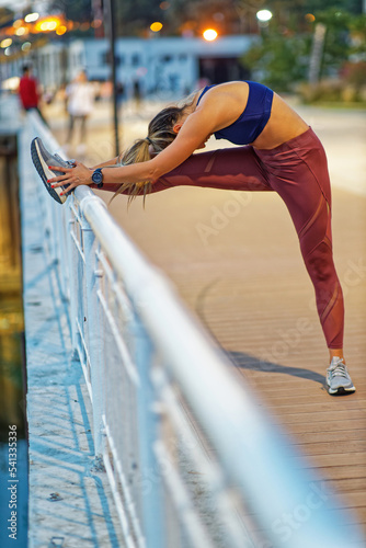 Young woman working out in the city