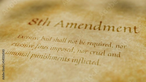 Scrolling text on an old paper background of the contents of the 8th amendment to the United States Constitution that guarantees the prohibition of cruel and unusual punishment.