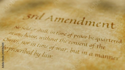 Scrolling text on old paper background of contents of the 3rd amendment to the United States Constitution that guarantees the government will not use private property without the consent of the owner