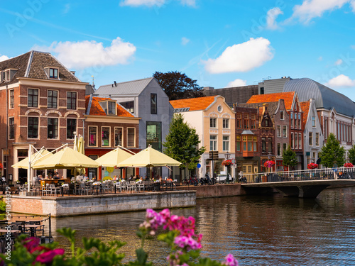 Scenic view of canals,boats and ancient buildings of Dutch city of Leiden, provi Fototapeta