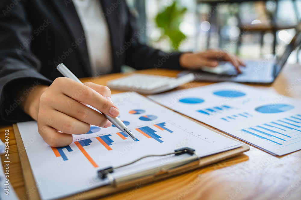 bookkeeper or financial inspector hands calculate making a report, calculating or checking balance. Home finances, investment, economy, saving money or insurance concept bookkeeper or financial inspector hands calculate making a report, calculating or checking balance. Home finances, investment, economy, saving money or insurance concept
