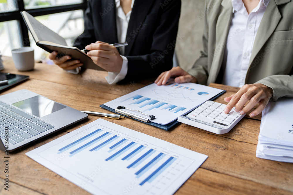 Business team meeting present. secretary presentation new idea and making report to professional investor with new finance project plan during discussion at meeting.