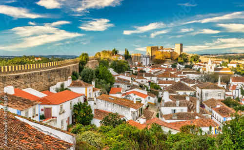 View of the wall and castle in the medieval village of Obidos in Portugal - Travel concept
 photo