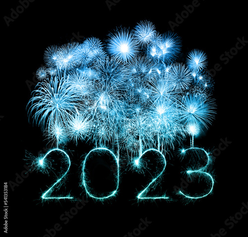 2023 happy new year fireworks celebration written sparkling at night.