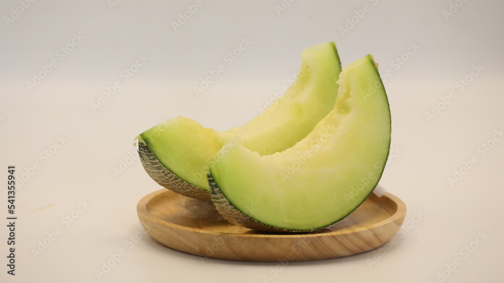 Melon, an appetizing fruit, peeled and ready to eat Melon, an appetizing fruit, peeled and ready to eat