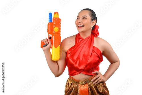 Portrait beautiful woman in Songkran festival with water gun