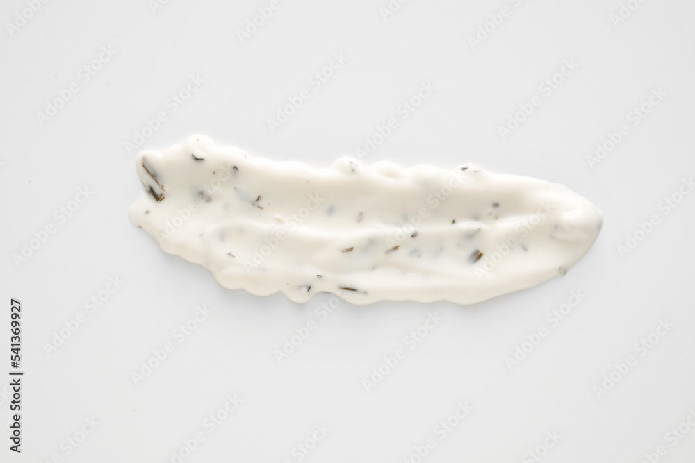 Smear of Caesar sauce on light background Smear of Caesar sauce on light background