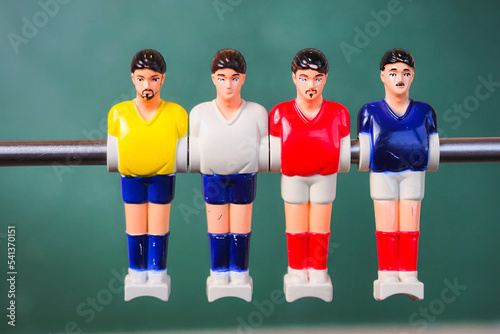 foosball players team plastic toy close up photo