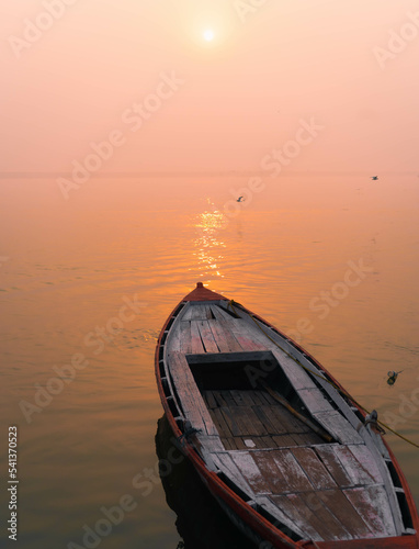 Obraz na plátně boat in ganges river at sunset india varanasi ghat