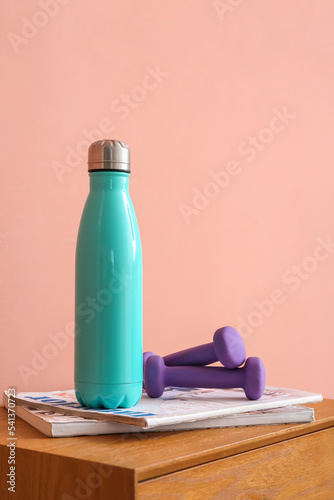Bottle of water, magazines ...