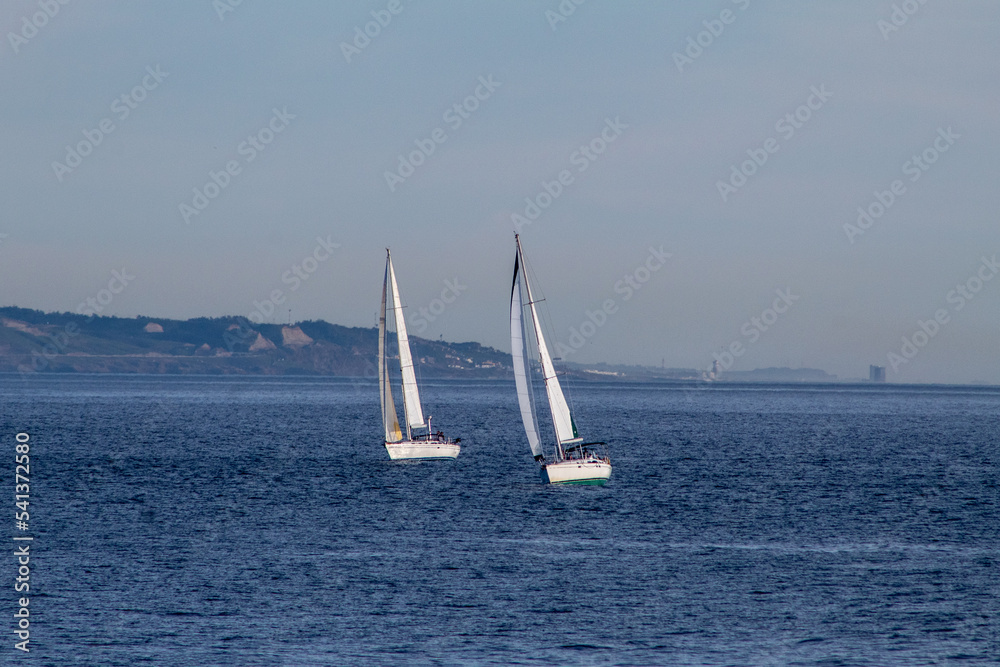 Two Sailboats Sailing in San Diego Bay Ocean.