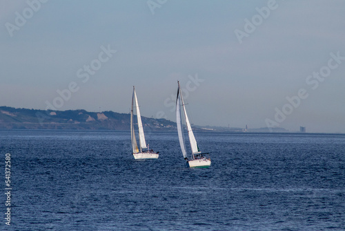 Two Sailboats Sailing in San Diego Bay Ocean.