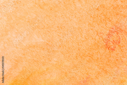 Orange abstract watercolor paper background.