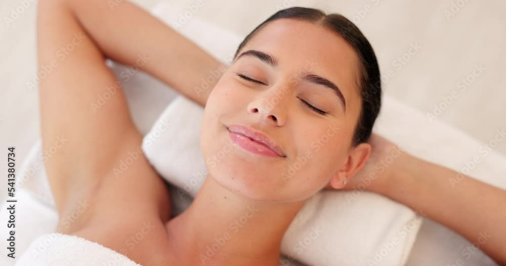 Spa, wellness and woman, calm and happy, peaceful after massage, massage therapy for body health and zen. Young person satisfied, lying down and carefree with peace and serene, stress relief. Spa, wellness and woman, calm and happy, peaceful after massage, massage therapy for body health and zen. Young person satisfied, lying down and carefree with peace and serene, stress relief.