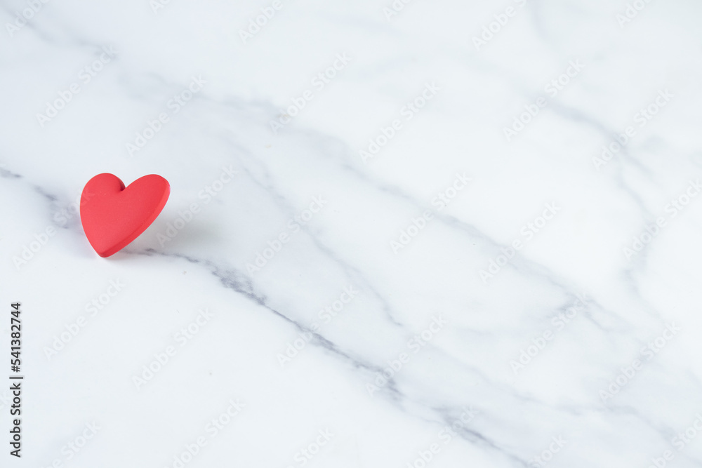 Red hearts on a cream colored background. Copy space. Red hearts on a cream colored background. Copy space.