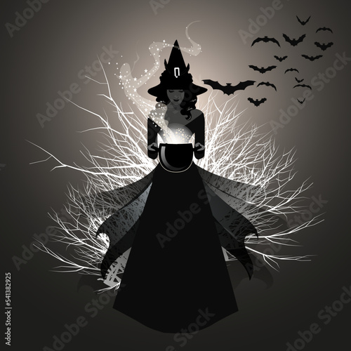 Young witch wearing a hat, carrying a cauldron and casting a spell. Bats and dry branches in the background.