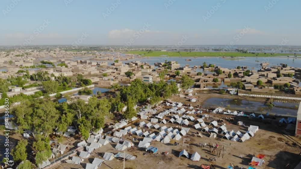 Aerial View Of Makeshift Camps For Flood Disaster Victims In Maher, Sindh. Dolly Back Aerial View Of Makeshift Camps For Flood Disaster Victims In Maher, Sindh. Dolly Back