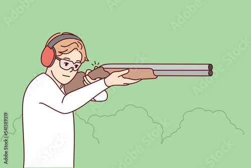 Man in headphones and glasses shoot with rifle in shooting gallery. Guy with weapon in hands hunting in park. Vector illustration. 