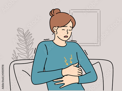 Unhealthy woman suffer from stomachache 