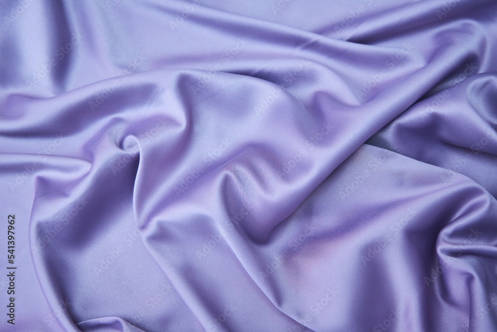 The texture of the fabric is purple. Textile industry for the creation of clothing. The texture of the fabric is purple. Textile industry for the creation of clothing.