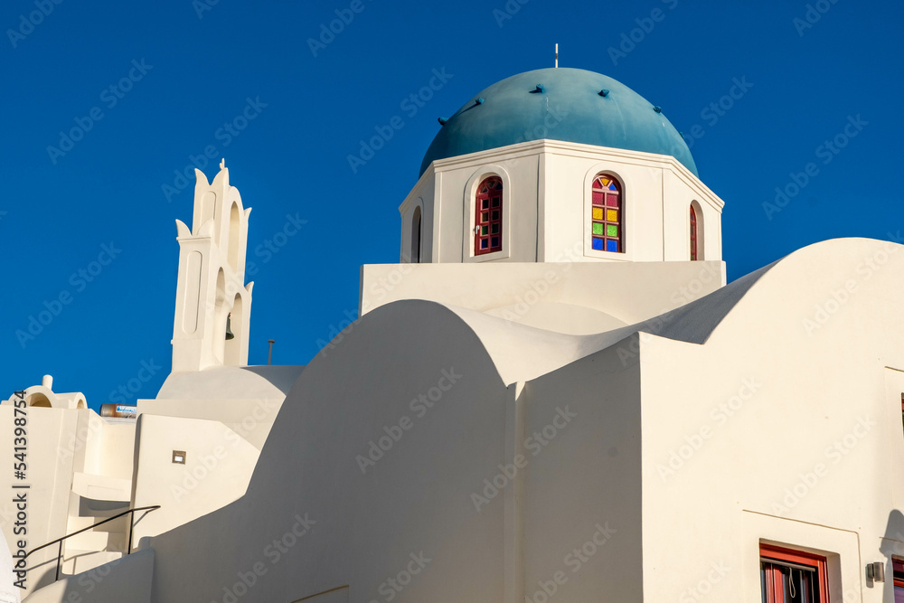 Large Greek Orthodox church at Oia town on Santorini Island