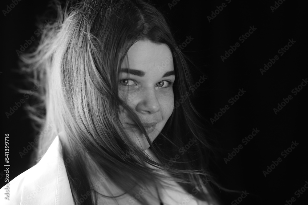Portrait of a beautiful seductive girl, black and white photo Portrait of a beautiful seductive girl, black and white photo